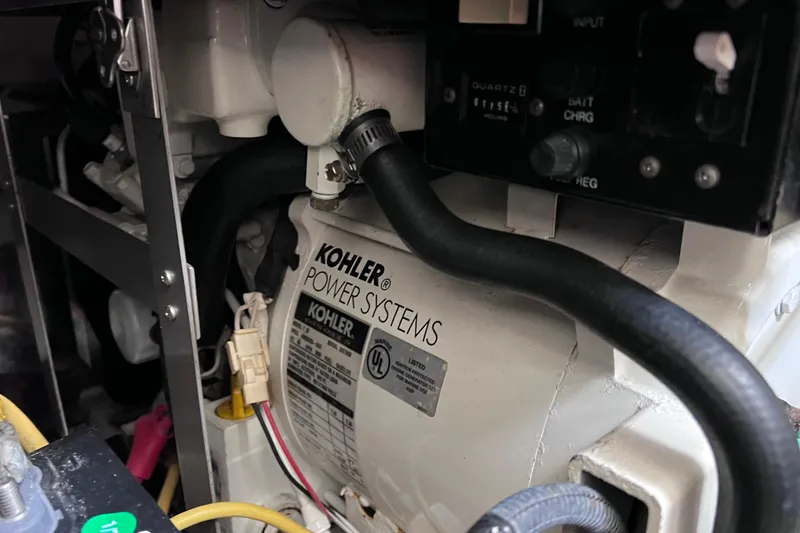 Slide: The Image of Kohler power system in 2005 Hydra-Sports Vector 3300 VX boat engine compartment. - 55