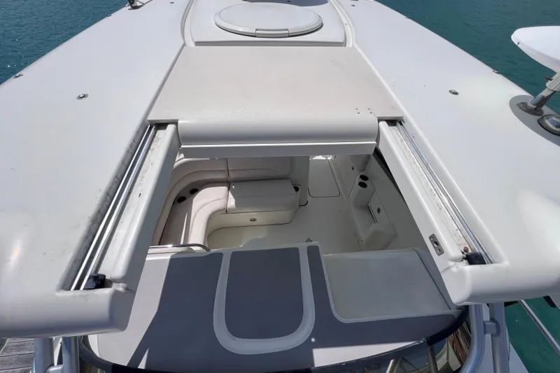 Slide: The Image of 2005 Hydra-Sports Vector 3300 VX cabin view with open hatch, showing interior seating. - 67