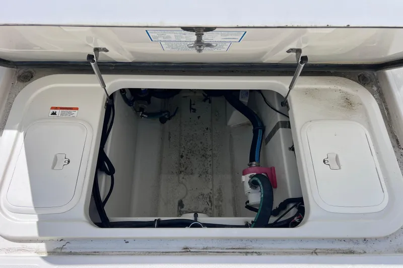 Slide: The Image of Open storage compartment of 2005 Hydra-Sports Vector 3300 VX boat. - 96