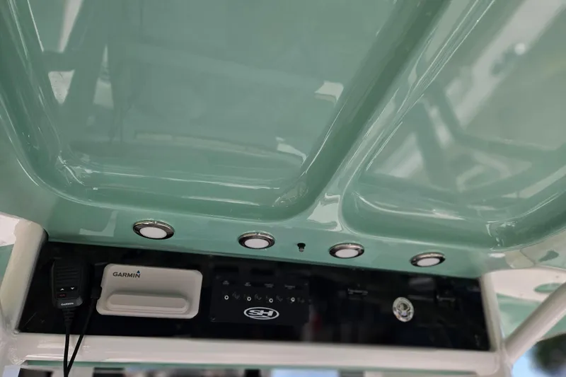 Slide: The Image of Interior view of 2026 Sea Hunt Ultra 255 SE boat console with Garmin equipment. - 21
