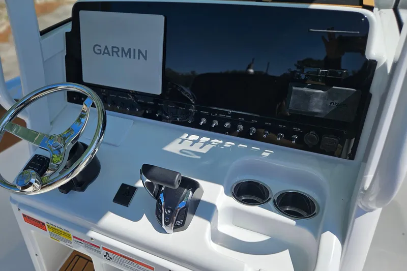 Slide: The Image of Helm of 2026 Sea Hunt Ultra 255 SE with Garmin navigation system. - 28