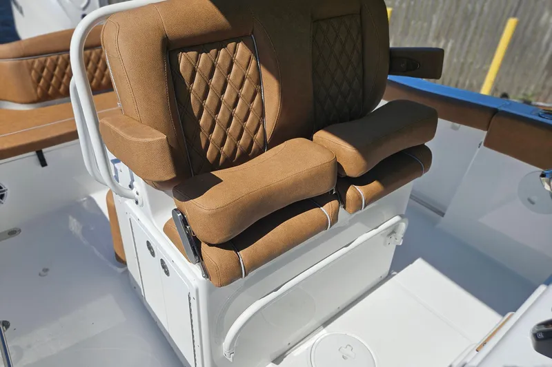 Slide: The Image of Luxurious brown seating on 2026 Sea Hunt Ultra 255 SE boat. - 29