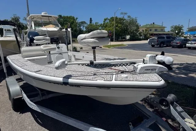 Slide: The Image of 2004 Ranger 191 Cayman boat on trailer, equipped with Minn Kota trolling motor. - 7