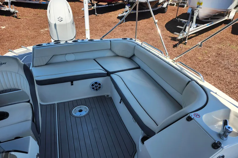 Slide: The Image of 2024 Stingray 212 SC boat interior with spacious seating and modern design. - 35