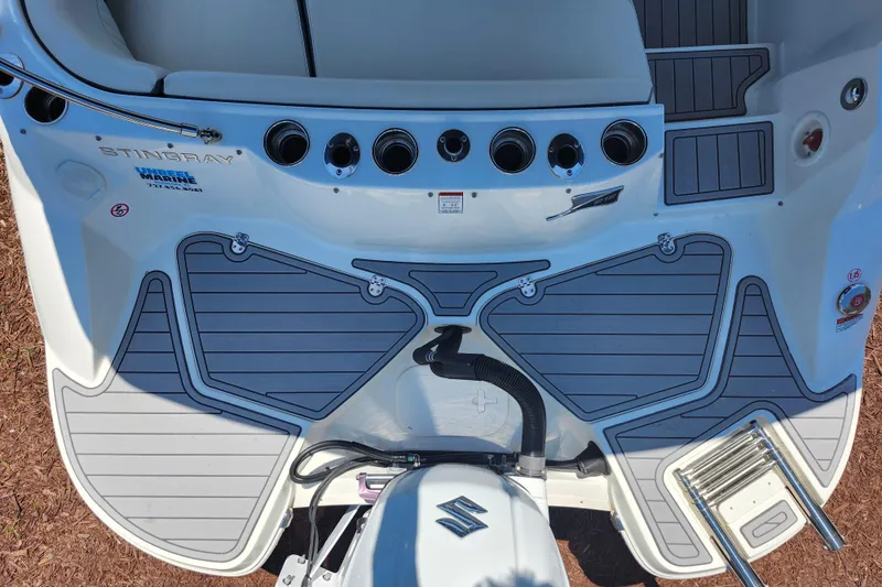 Slide: The Image of 2024 Stingray 212 SC boat deck with sleek design and modern fittings. - 42
