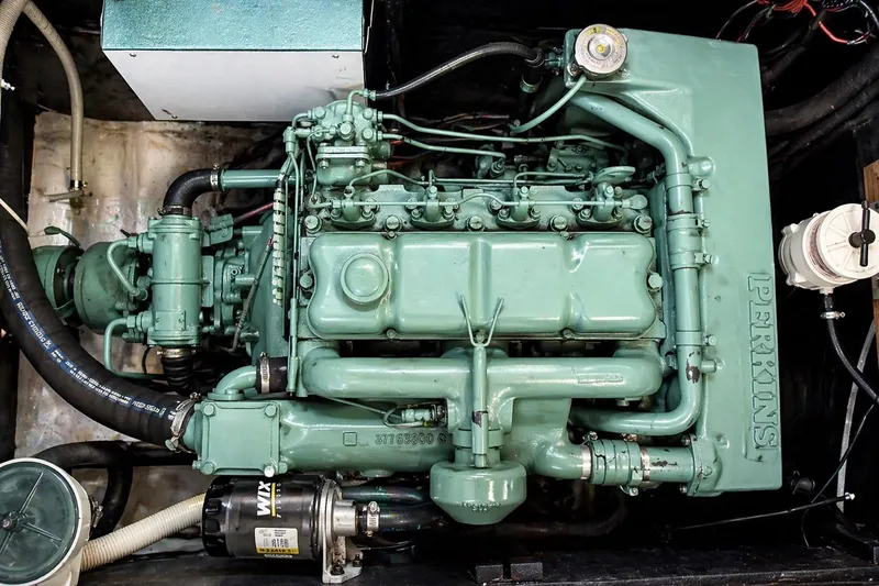 Slide: The Image of Interior of 1975 Apollo 32 Deluxe TT yacht with wood finish, kitchen, and seating area. - 10