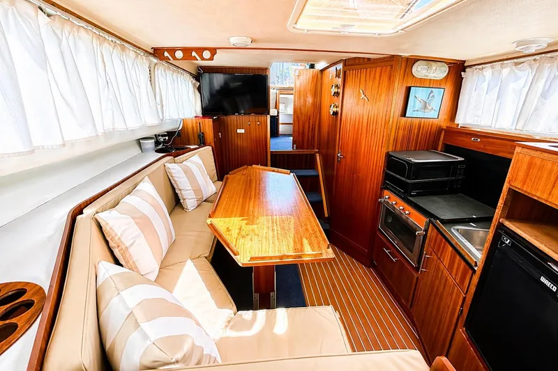 Slide: The Image of Control panel of a 1975 Apollo 32 Deluxe TT with Perkins marine diesel gauges. - 15