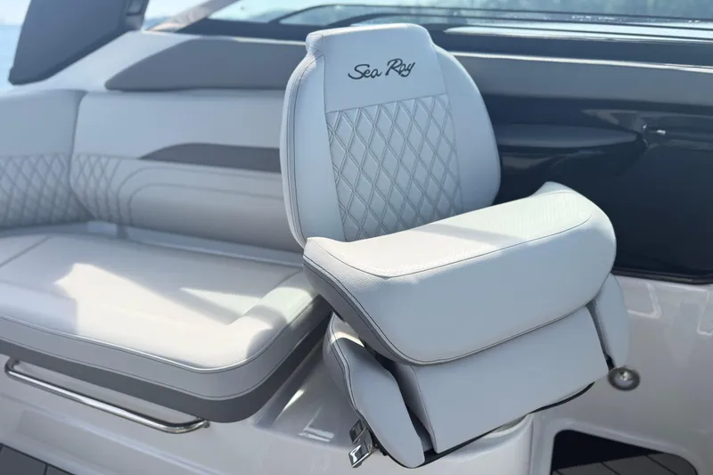 Slide: The Image of 2023 Sea Ray SLX 260 boat interior with luxurious seating and elegant design. - 15