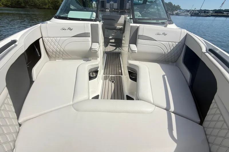 Slide: The Image of 2023 Sea Ray SLX 260 boat interior with luxurious seating and elegant design. - 20