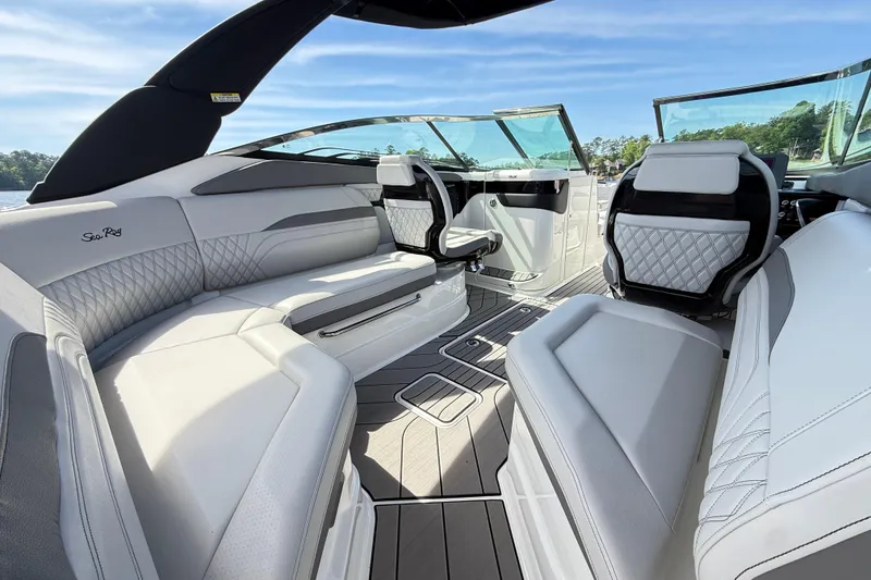 Slide: The Image of Luxurious interior of 2023 Sea Ray SLX 260 boat with elegant seating and modern design. - 7