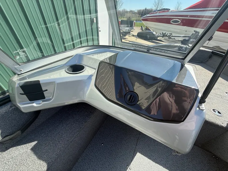 Slide: The Image of 2017 Tracker Pro Guide V-16 WT boat console, close-up view. - 17