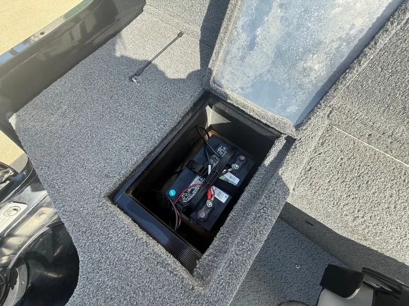 Slide: The Image of Battery compartment of a 2017 Tracker Pro Guide V-16 WT boat. - 20