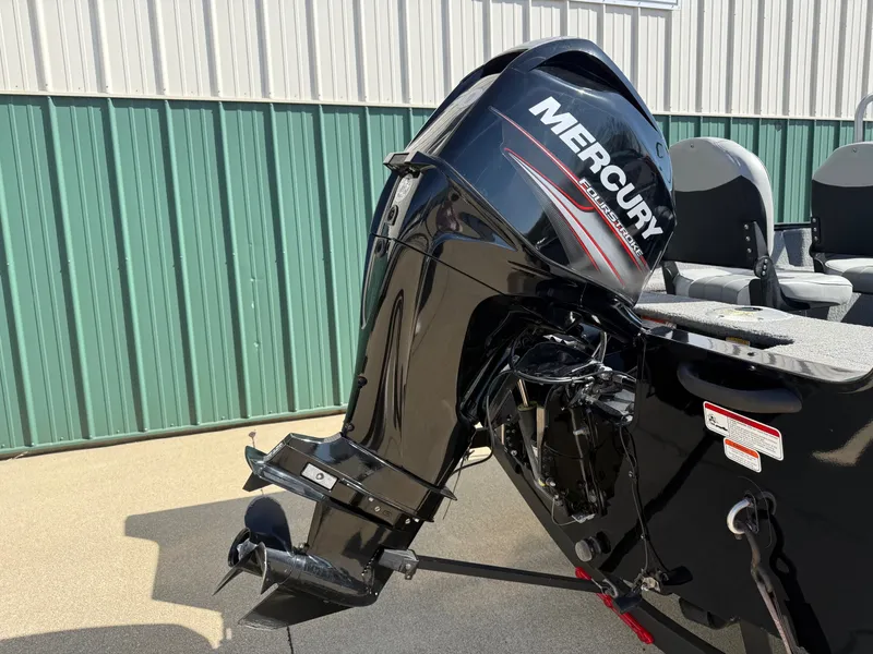 Slide: The Image of 2017 Tracker Pro Guide V-16 WT with Mercury outboard motor. - 24