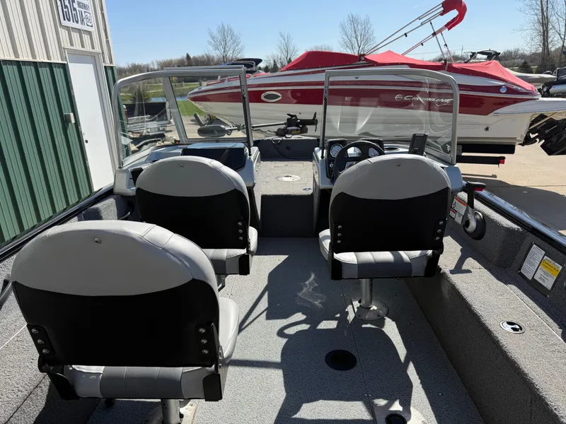 Slide: The Image of Interior view of a 2017 Tracker Pro Guide V-16 WT boat. - 25