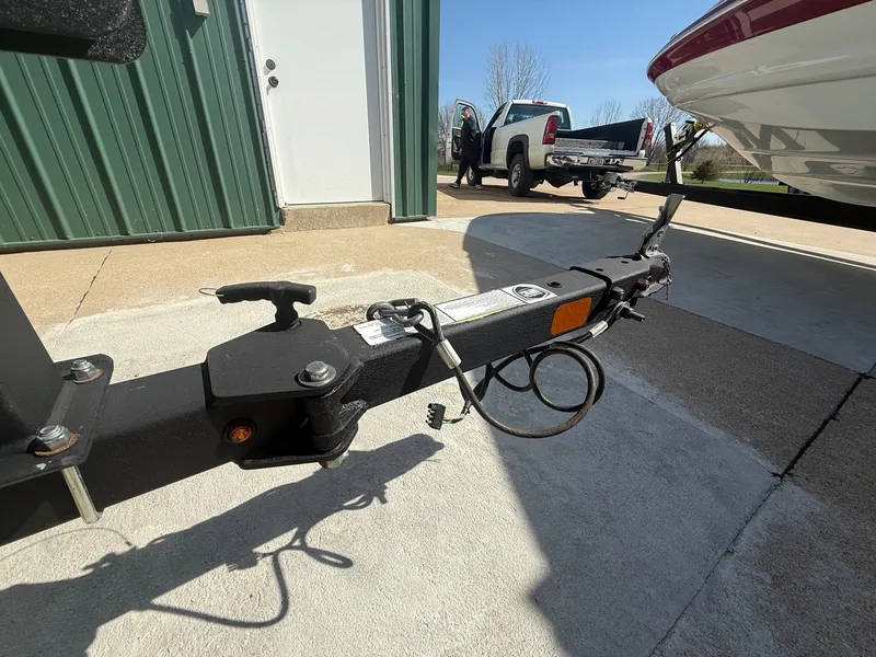 Slide: The Image of Trailer of a 2017 Tracker Pro Guide V-16 WT boat. - 30