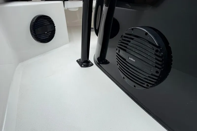 Slide: The Image of Speakers on 2026 Sea Pro 225FLX Sandbar boat interior, featuring sleek black design. - 16