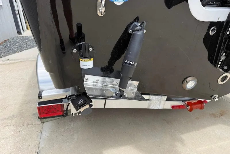 Slide: The Image of Rear view of a 2026 Sea Pro 225FLX Sandbar boat with hydraulic steering system. - 7