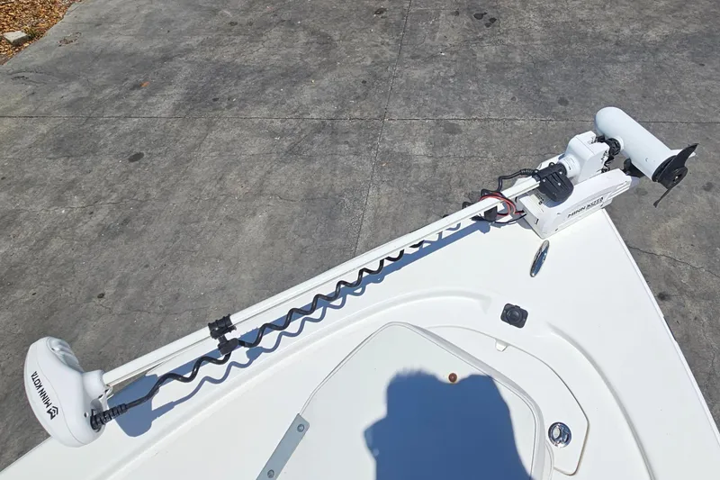 Slide: The Image of Trolling motor on 2022 Sea Pro 228 Bay boat, parked on concrete surface. - 31