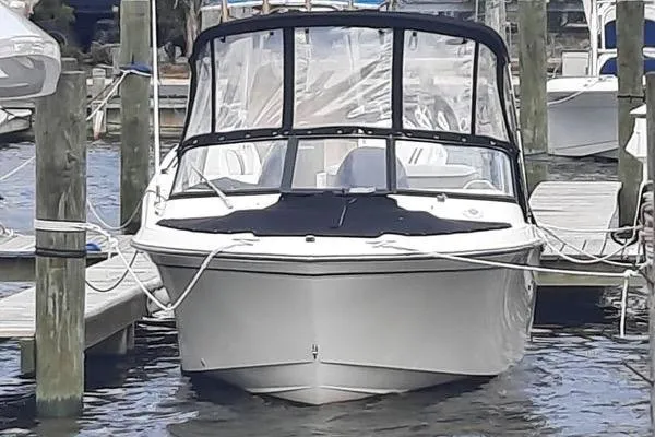 Slide: The Image of 2016 Grady-White Freedom 205 boat docked at marina, front view. - 2