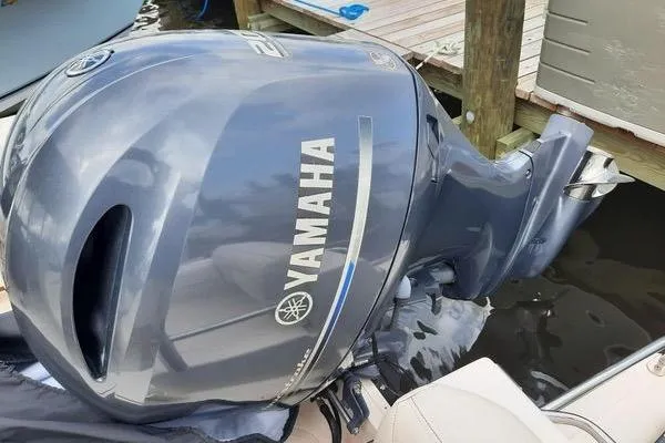Slide: The Image of Yamaha outboard motor on 2016 Grady-White Freedom 205 boat at dock. - 28