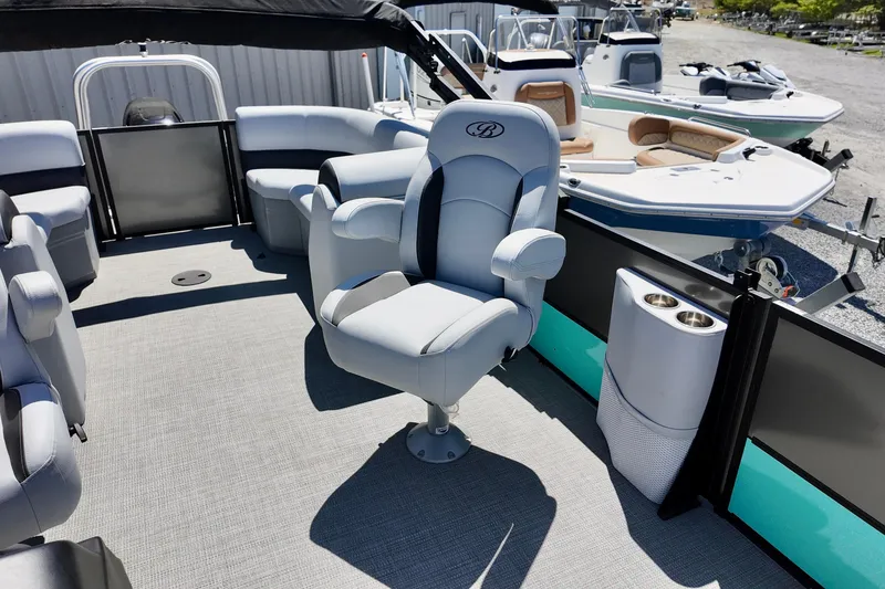 Slide: The Image of 2024 Bentley Pontoons 24 Legacy interior with luxurious seating and modern design. - 3