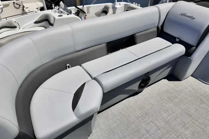 Slide: The Image of 2024 Bentley Pontoons 24 Legacy boat interior with luxurious seating. - 4