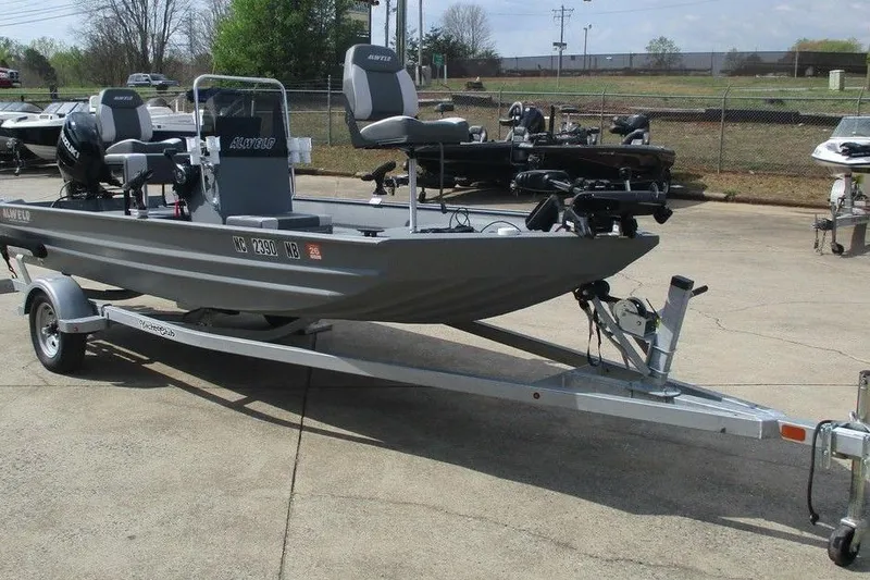 Slide: The Image of 2023 Alweld 1756 Marsh boat on trailer, parked outdoors. - 6