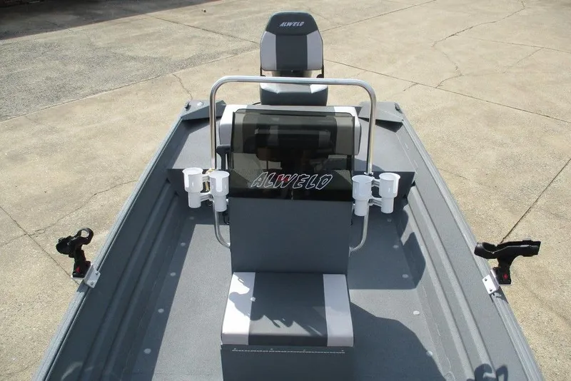 Slide: The Image of 2023 Alweld 1756 Marsh boat interior with console and rod holders. - 7