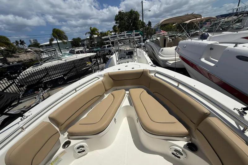 Slide: The Image of Storage compartment of 2019 NauticStar 2102 Legacy boat with ropes and equipment. - 17