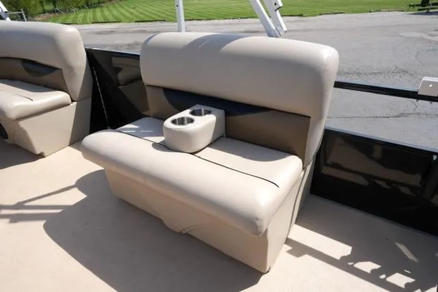 Slide: The Image of Beige seating with cup holders on a 2017 Bentley 244 boat. - 9