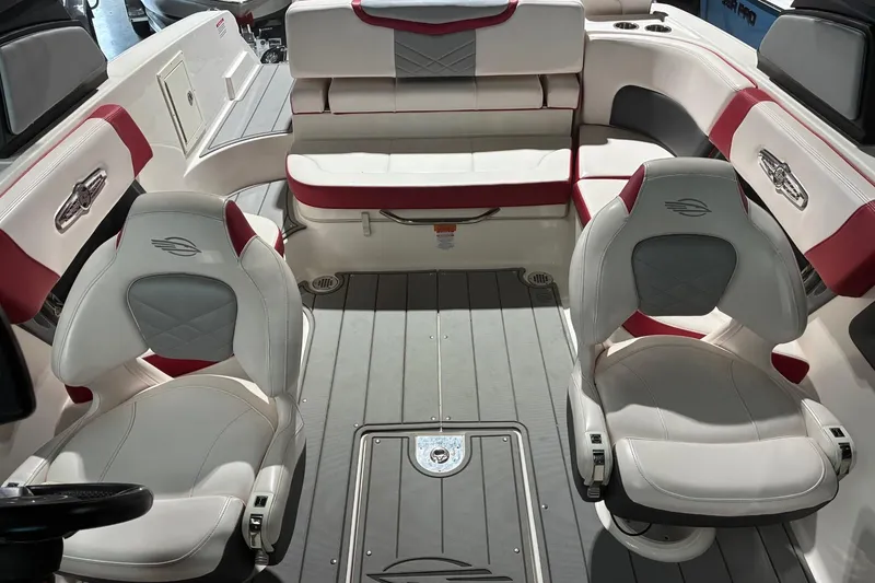 Slide: The Image of Interior of 2020 Chaparral 25 Surf boat with white and red seating. - 13
