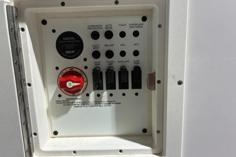 Slide: The Image of Control panel of a 2020 Chaparral 25 Surf boat with switches and digital relay. - 15
