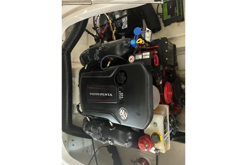 Slide: The Image of Volvo Penta engine in 2020 Chaparral 25 Surf boat, showcasing detailed components. - 18