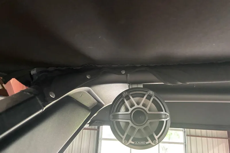 Slide: The Image of Speaker system inside a 2020 Chaparral 25 Surf boat, featuring JL Audio equipment. - 24