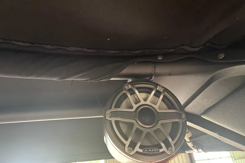 Slide: The Image of Speaker system inside a 2020 Chaparral 25 Surf boat. - 25