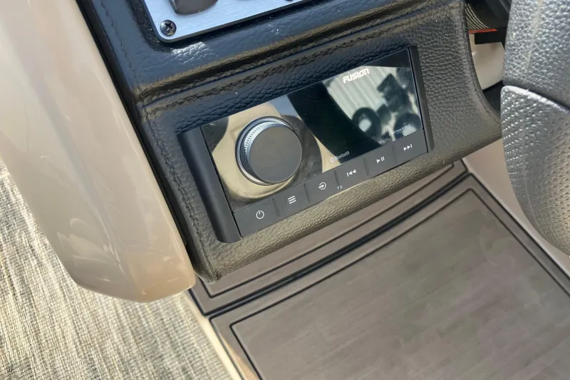 Slide: The Image of Control panel of 2023 Godfrey Monaco 255 SB with Fusion audio system. - 15