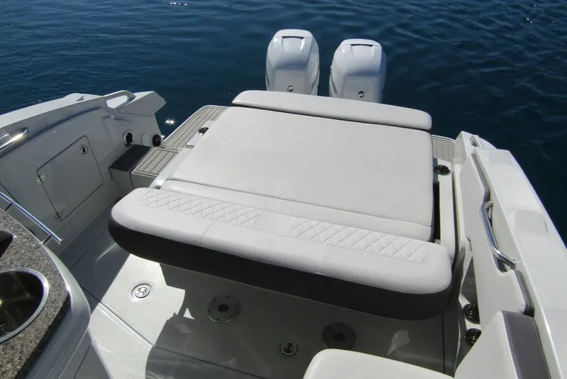 Slide: The Image of The aft seat backrest is electronically adjustable to allow you to face forward while underway, aft while anchored, or lie flat to enjoy a comfortable sunbed. - 5