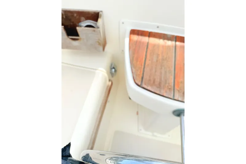 Slide: The Image of 1984 Island Packet boat interior with wooden and metal details. - 9