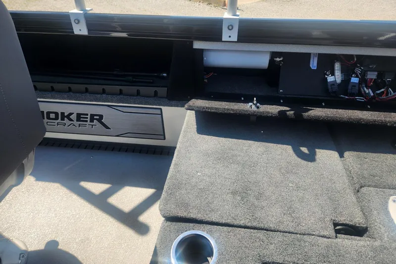 Slide: The Image of 2026 Smoker Craft Adventurer 210 GLS Sport boat interior with storage compartments. - 20