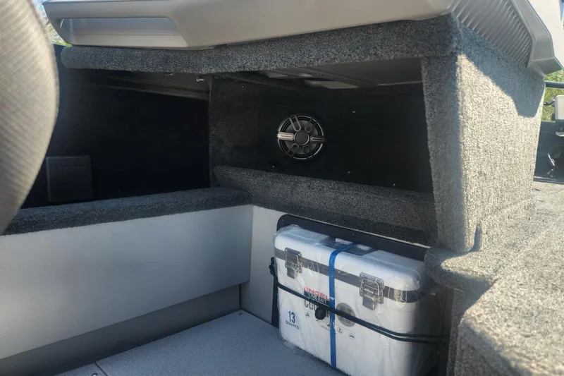 Slide: The Image of Interior of 2026 Smoker Craft Adventurer 210 GLS Sport with storage and speaker. - 24