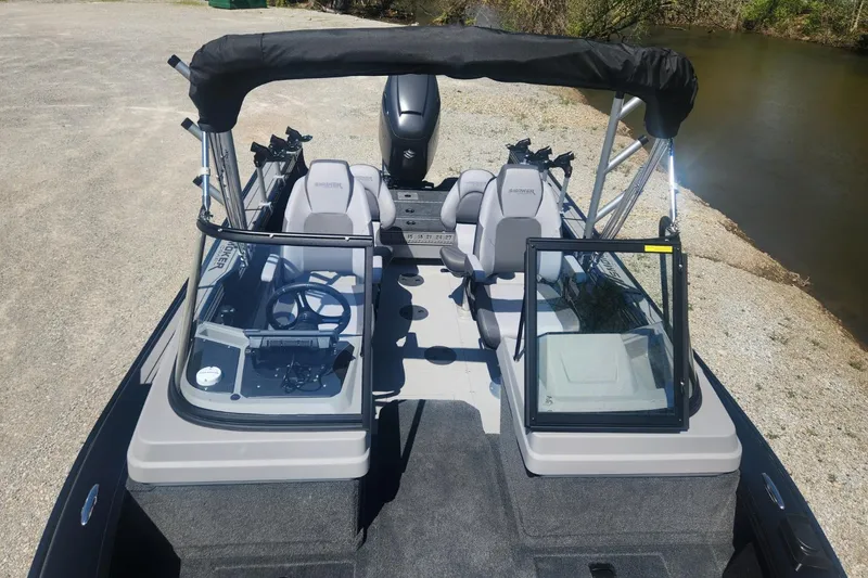 Slide: The Image of 2026 Smoker Craft Adventurer 210 GLS Sport boat with open cockpit and seating. - 30