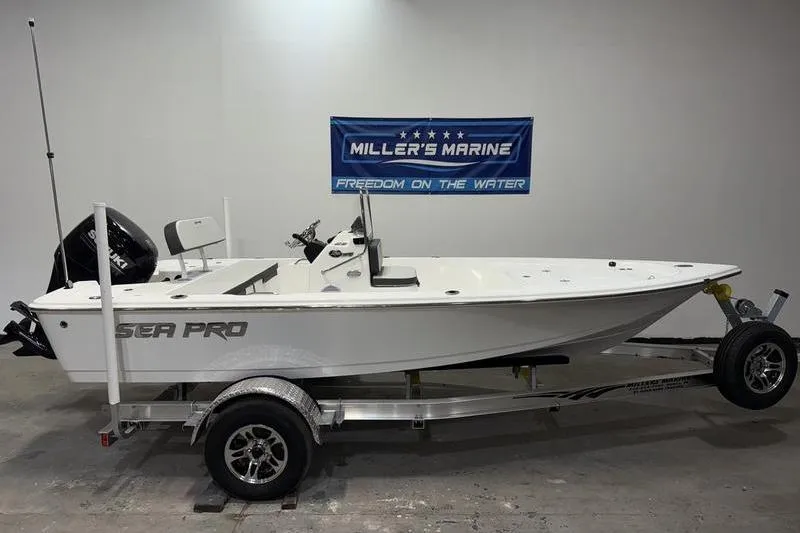 The Image of 2026 Sea Pro 172 Bay boat on trailer at Miller's Marine showroom. - 0