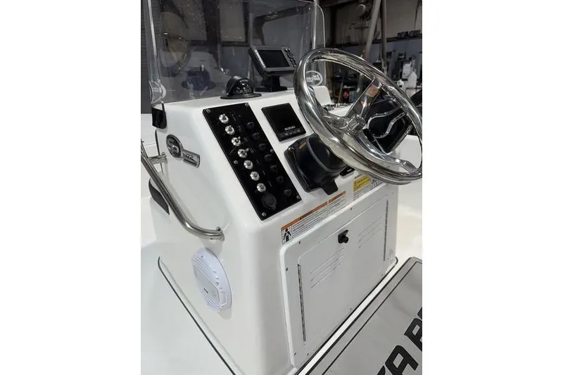Slide: The Image of 2026 Sea Pro 172 Bay boat console with steering wheel and control panel. - 10
