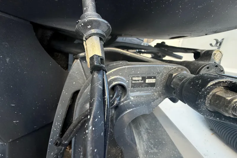 Slide: The Image of Close-up of Yamaha outboard motor components on a 2004 Wellcraft 32 CCF boat. - 31