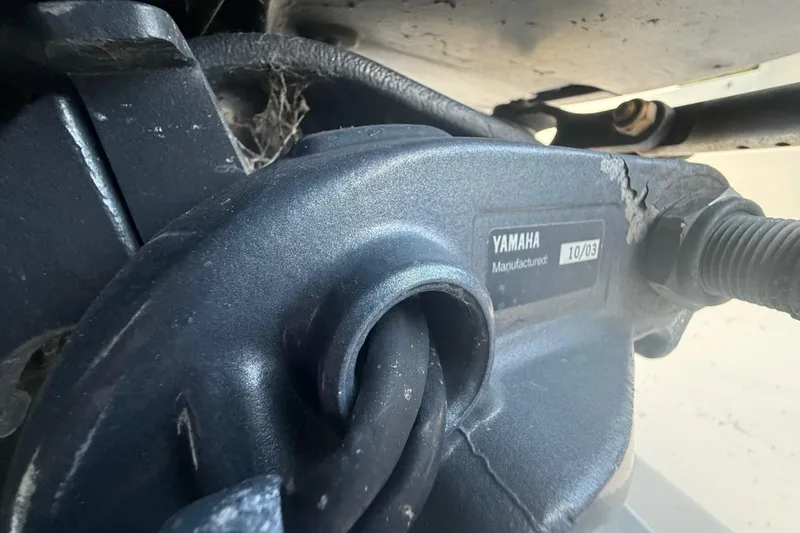 Slide: The Image of Close-up of Yamaha engine part on 2004 Wellcraft 32 CCF boat. - 32