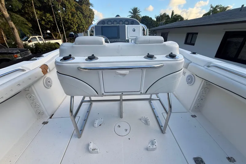 Slide: The Image of 2004 Wellcraft 32 CCF boat interior with seating and control panel. - 41