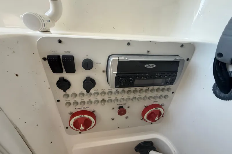 Slide: The Image of Control panel of a 2004 Wellcraft 32 CCF boat with Clarion stereo system. - 50