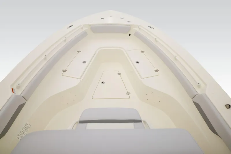 Slide: The Image of 2026 Mako 226 Center Console boat interior with steering wheel and seating. - 5