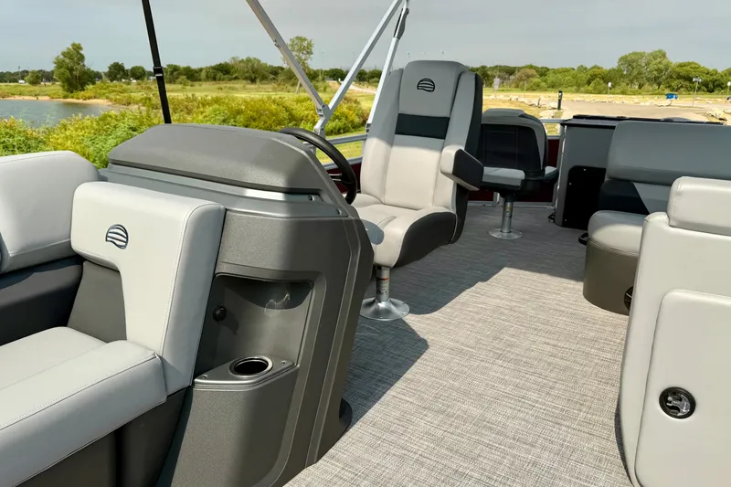 Slide: The Image of 2026 Sun Tracker SportFish 22 DLX interior with comfortable seating and modern design. - 16
