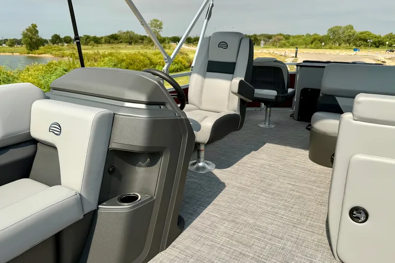 Slide: The Image of 2026 Sun Tracker SportFish 22 DLX interior with comfortable seating and modern design. - 15